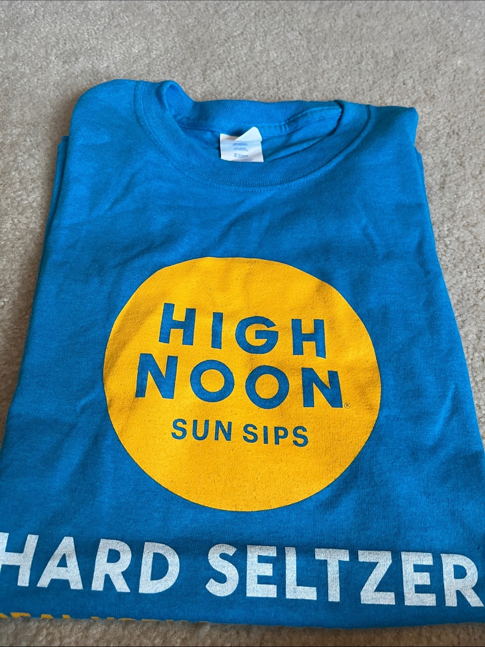 Gildan Teal Short Sleeve Tee with Yellow High Noon Logo. Small. Men or unisex.